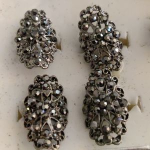 1 Silver rhinestone statement ring. $1 with purchase of another item in closet.